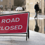 Photo of a road closed due to flooding. News post about resources available for Flood Action Week. Photo-Raylipscombe sourced from Canva.